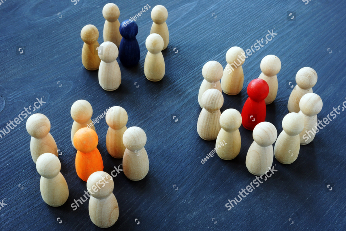 stock-photo-influencer-marketing-concept-groups-of-wooden-figures-1296897748