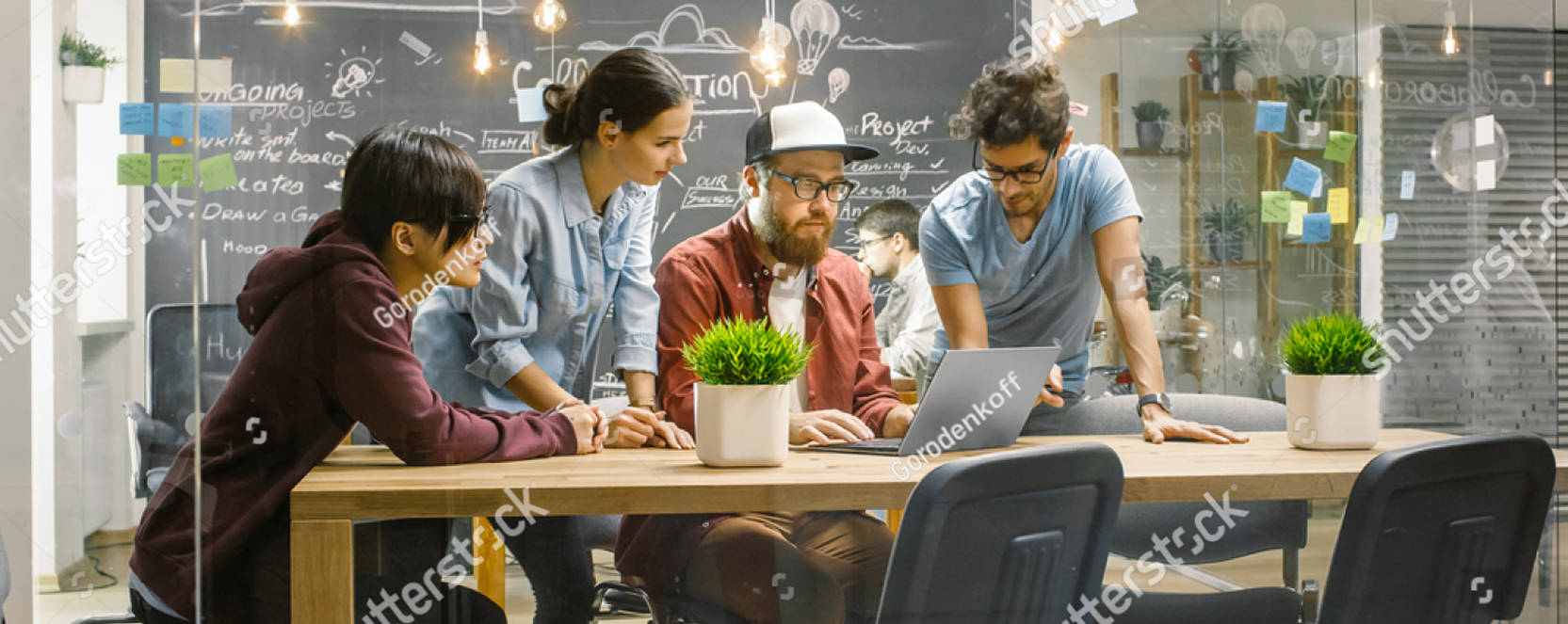 stock-photo-three-creative-people-have-active-discussion-about-ongoing-project-while-using-laptop-stylish-1773518771