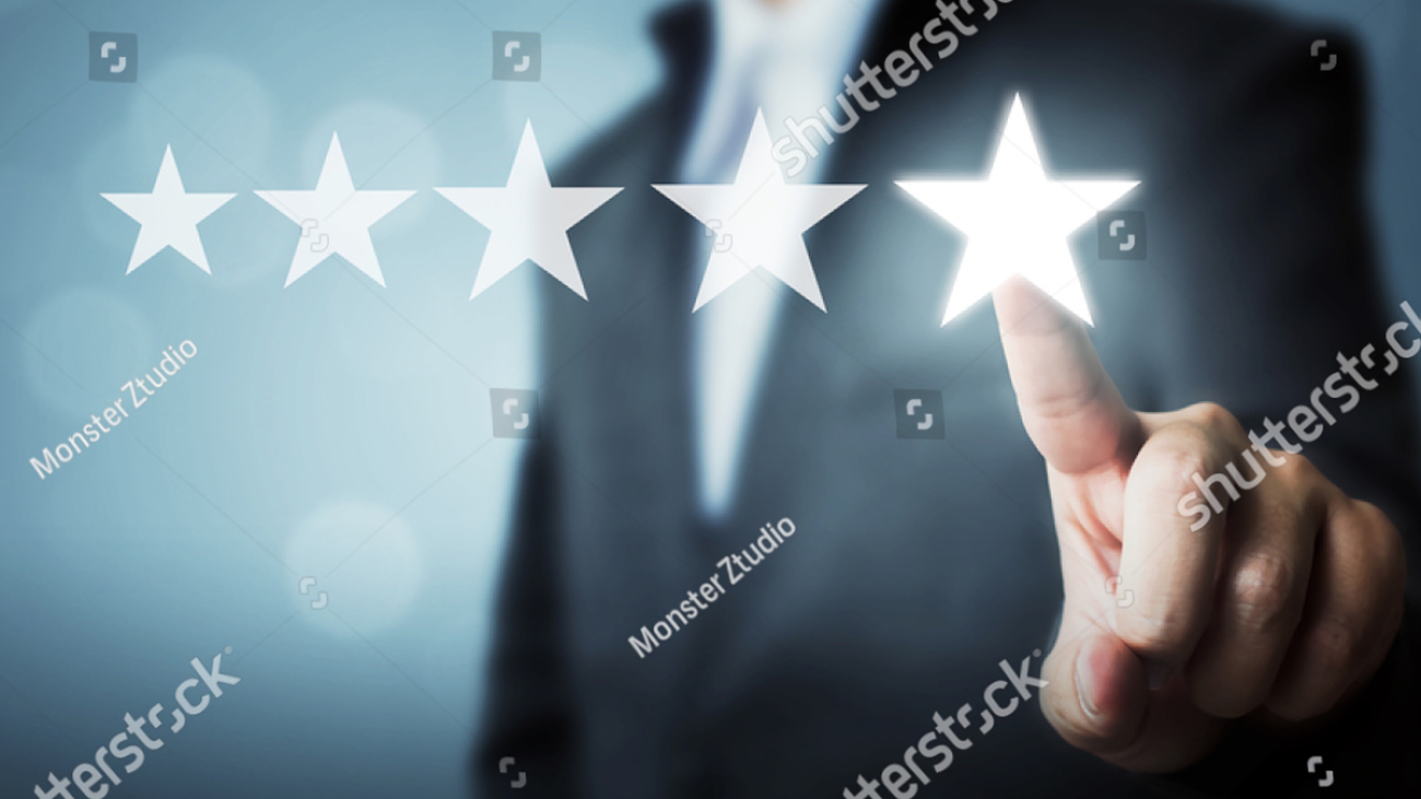 stock-photo-businessman-pointing-five-star-symbol-to-increase-rating-of-company-623080877