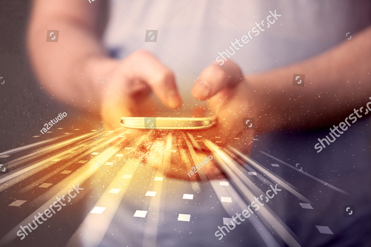 stock-photo-person-holding-smarthphone-with-technology-light-applications-comming-out-373361509